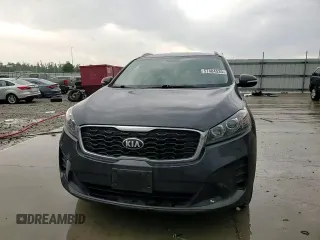 2019 Kia Sorento LX z VIN 5XYPG4A34KG534173, wystawiony jako Copart lot #57404535 z przebiegiem 112 688 mil mil oraz Szkoda całkowita • Salvage title. Historia ofert i sprzedaży dostępna na DreamBid. Obrazek 14.