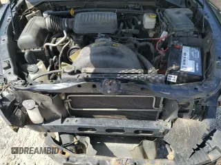 2006 Mitsubishi Raider Duro Cross z VIN 1Z7HC38K26S576434, wystawiony jako Copart lot #53798965 z przebiegiem 198 820 mil mil oraz Szkody całkowita. Historia ofert i sprzedaży dostępna na DreamBid. Obrazek 11.