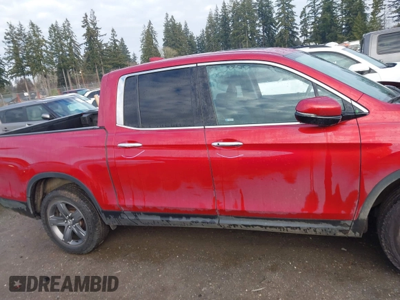 2022 Honda Ridgeline RTL-E with VIN 5FPYK3F74NB011358, listed as a IAAI auction lot 41431157 with 26,116 mi miles and . Bid and sale history available at DreamBid. Image 14.