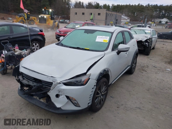 2016 Mazda CX-3 Grand Touring with VIN JM1DKFD7XG0132084, listed as a IAAI auction lot 41004954 with 70,476 mi miles. Bid and sale history available at carsss.com. Image 17.