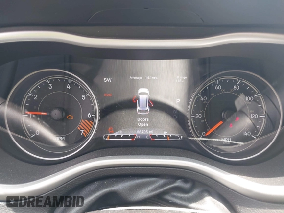 2015 Jeep Cherokee Trailhawk with VIN 1C4PJMBB0FW528421, listed as a IAAI auction lot 42591132 with 166,425 mi miles and . Bid and sale history available at DreamBid. Image 7.
