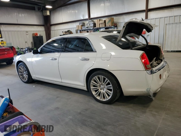 2011 Chrysler 300 Limited with VIN 2C3CA5CG2BH595839, listed as a Copart auction lot 74777624 with 184,642 mi miles and Non Repairable. Bid and sale history available at carsss.com. Image 2.