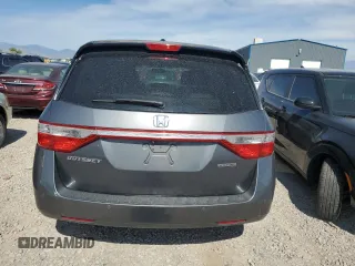 2012 Honda Odyssey Touring с VIN 5FNRL5H95CB120347, выставлен на аукционе Copart как лот 59111775 с пробегом 208 419 миль миль и Списание • Salvage title. История ставок и продаж доступна на DreamBid. Изображение 6.