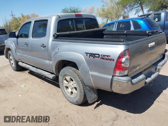 2015 Toyota Tacoma with VIN 3TMLU4EN6FM188736, listed as a IAAI auction lot 42605859 with 210,717 mi miles and . Bid and sale history available at DreamBid. Image 3.