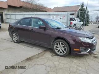 2012 Ford Fusion SEL with VIN 3FAHP0JA6CR376167, listed as a Copart auction lot 53024435 with 159,329 mi miles and Salvage Title. Bid and sale history available at DreamBid. Image 4.