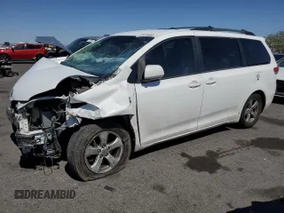 2011 Toyota Sienna LE AAS with VIN 5TDKK3DCXBS040935, listed as a Copart auction lot 57676965 with 198,473 mi miles and Salvage title. Bid and sale history available at DreamBid. Image 1.