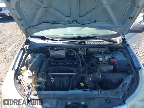 2008 Ford Focus SE z VIN 1FAHP35N58W226540, wystawiony jako IAAI lot #42383245 z przebiegiem 183 312 mil mil oraz . Historia ofert i sprzedaży dostępna na DreamBid. Obrazek 10.
