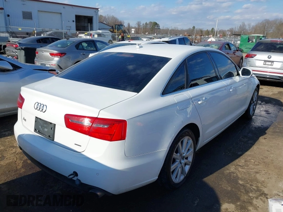 2015 Audi A6 2.0T Premium Plus with VIN WAUGFAFC6FN012134, listed as a IAAI auction lot 41363086 with 103,339 mi miles. Bid and sale history available at carsss.com. Image 4.