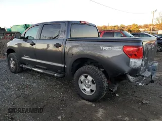 2011 Toyota Tundra 4WD Truck with VIN 5TFDY5F12BX205210, listed as a Copart auction lot 79915794 with 214,543 mi miles and Salvage Title. Bid and sale history available at carsss.com. Image 2.