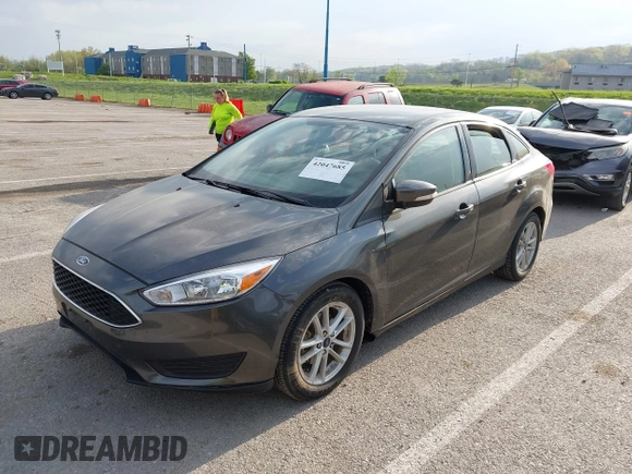 2017 Ford Focus SE with VIN 1FADP3F21HL228709, listed as a IAAI auction lot 42047685 with 41,107 mi miles and . Bid and sale history available at DreamBid. Image 2.