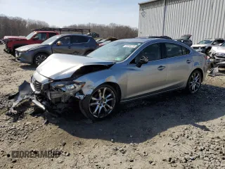 2014 Mazda 6 i Grand Touring с VIN JM1GJ1W50E1111072, выставлен на аукционе Copart как лот 49296175 с пробегом 231 606 миль миль и Списание • Salvage title. История ставок и продаж доступна на DreamBid. Изображение 1.