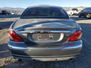 2004 Jaguar X-Type with VIN SAJEA51C74WD70684, listed as a Copart auction lot 46536395 with 155,184 mi miles and Salvage Title. Bid and sale history available at carsss.com. Image 6.