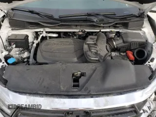 2024 Honda Odyssey Touring z VIN 5FNRL6H81RB063067, wystawiony jako Copart lot #49789175 z przebiegiem 16 581 mil mil oraz Szkoda całkowita • Salvage title. Historia ofert i sprzedaży dostępna na DreamBid. Obrazek 13.