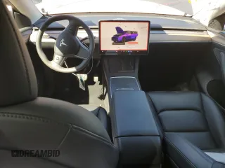 2022 Tesla Model Y Long Range z VIN 7SAYGDEE3NF543705, wystawiony jako Copart lot #50244955 z przebiegiem 59 063 mil mil oraz Szkody całkowita. Historia ofert i sprzedaży dostępna na DreamBid. Obrazek 8.