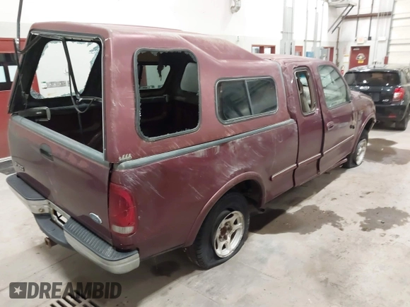 1997 Ford F-150 XL with VIN 1FTEX18L3VKC91921, listed as a IAAI auction lot 41820453 with 210,553 mi miles. Bid and sale history available at carsss.com. Image 14.