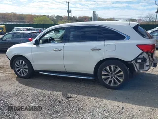 2016 Acura MDX w/Tech with VIN 5FRYD4H43GB014801, listed as a IAAI auction lot 39256120 with 73,769 mi miles. Bid and sale history available at carsss.com. Image 14.