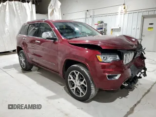 2019 Jeep Grand Cherokee Overland with VIN 1C4RJFCT3KC687246, listed as a Copart auction lot 52098394 with 74,113 mi miles and Salvage Title. Bid and sale history available at carsss.com. Image 4.