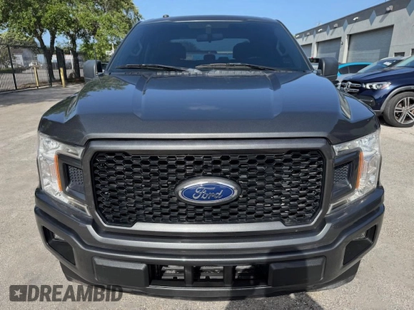 2019 Ford F-150 XL with VIN 1FTEW1CP1KKF22890, listed as a Copart auction lot 61813095 with 63,774 mi miles and Salvage title. Bid and sale history available at DreamBid. Image 5.
