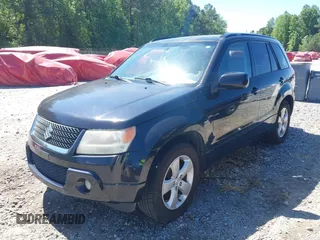2009 Suzuki Grand Vitara z VIN JS3TE047094100192, wystawiony jako IAAI lot #42336959 z przebiegiem 244 995 mil mil oraz . Historia ofert i sprzedaży dostępna na DreamBid. Obrazek 2.