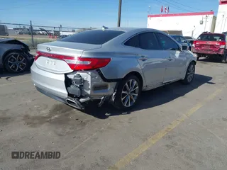 2015 Hyundai Azera z VIN KMHFG4JG0FA453994, wystawiony jako IAAI lot #42002922 z przebiegiem 102 094 mil mil oraz . Historia ofert i sprzedaży dostępna na DreamBid. Obrazek 4.