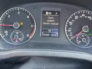 2014 Volkswagen Passat TDI SEL Premium with VIN 1VWCN7A33EC092174, listed as a IAAI auction lot 41690739 with 141,095 mi miles. Bid and sale history available at carsss.com. Image 7.