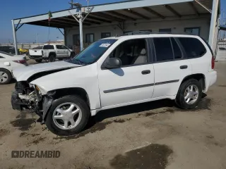 2008 GMC Envoy SLE1 with VIN 1GKDS13S182137239, listed as a Copart auction lot 69627594 with 135,160 mi miles and Salvage Title. Bid and sale history available at DreamBid. Image 1.