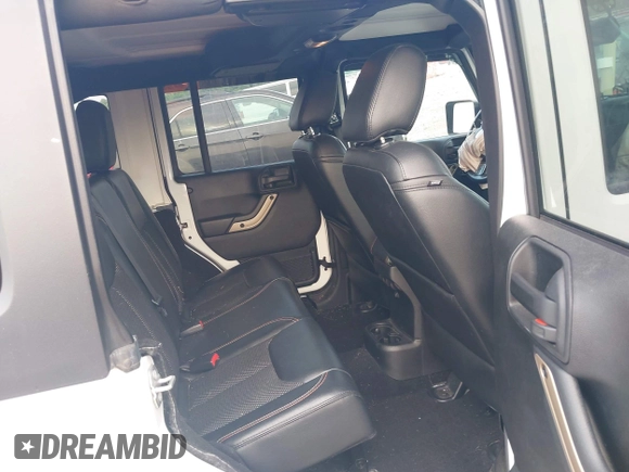 2017 Jeep Wrangler Unlimited Sahara with VIN 1C4HJWEG3HL505307, listed as a IAAI auction lot 42497015 with 92,790 mi miles and . Bid and sale history available at DreamBid. Image 8.