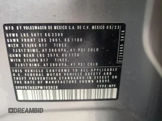 2023 Volkswagen Tiguan S with VIN 3VVFB7AXXPM103928, listed as a Copart auction lot 57119895 with 13,820 mi miles and Salvage title. Bid and sale history available at DreamBid. Image 14.