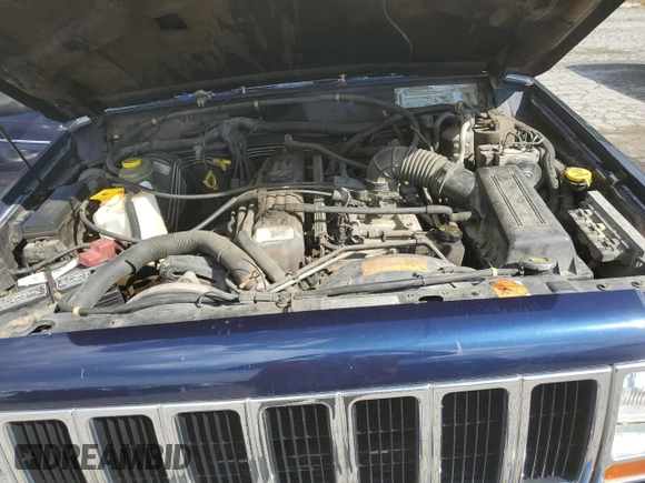 1997 Jeep Cherokee with VIN 1J4FN78S6VL604971, listed as a Copart auction lot 70690304 with 226,913 mi miles and Salvage title. Bid and sale history available at DreamBid. Image 12.