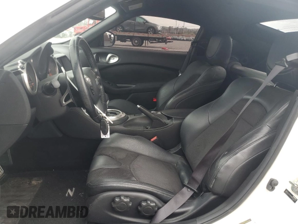 2017 Nissan 370Z z VIN JN1AZ4EH9HM952650, wystawiony jako Copart lot #49354135 z przebiegiem 62 141 mil mil oraz Szkoda całkowita • Salvage title. Historia ofert i sprzedaży dostępna na DreamBid. Obrazek 7.