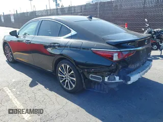 2019 Lexus ES 300h with VIN JTHB21B11K2024098, listed as a IAAI auction lot 42082628 with 92,280 mi miles and . Bid and sale history available at DreamBid. Image 3.