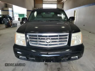 2006 Cadillac Escalade z VIN 1GYEK63N56R139033, wystawiony jako Copart lot #59661465 z przebiegiem Nie podano mil oraz Czysty tytuł • Clean title. Historia ofert i sprzedaży dostępna na DreamBid. Obrazek 5.