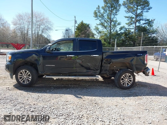 2015 GMC Canyon 2WD SLT with VIN 1GTG5CE35F1249224, listed as a IAAI auction lot 41697796 with 180,230 mi miles. Bid and sale history available at carsss.com. Image 14.