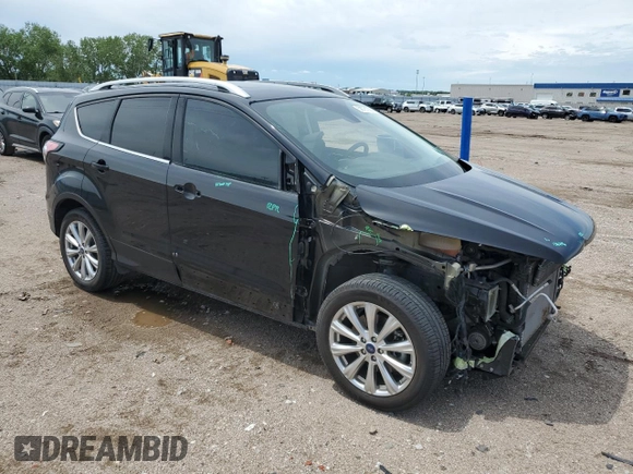 2018 Ford Escape Titanium with VIN 1FMCU9J95JUB31286, listed as a Copart auction lot 58721355 with 100,329 mi miles and Salvage title. Bid and sale history available at DreamBid. Image 4.