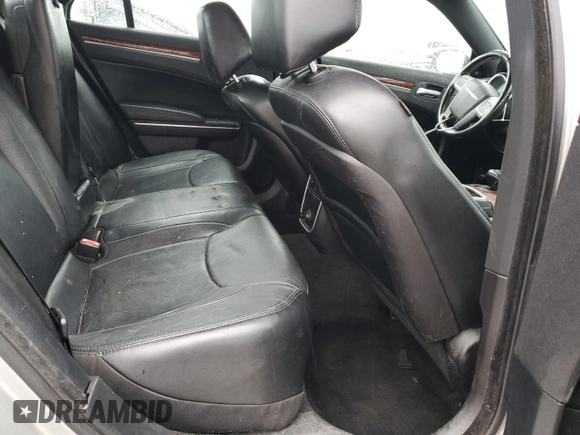 2012 Chrysler 300 Limited z VIN 2C3CCACG3CH310263, wystawiony jako Copart lot #83744764 z przebiegiem 246 532 mil mil oraz Szkoda całkowita • Salvage title. Historia ofert i sprzedaży dostępna na DreamBid. Obrazek 11.