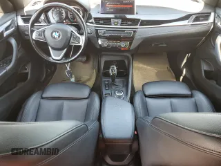 2021 BMW X2 sDrive28i z VIN WBXYH9C06M5S54903, wystawiony jako Copart lot #57177885 z przebiegiem 106 563 mil mil oraz Tytuł czysty. Historia ofert i sprzedaży dostępna na DreamBid. Obrazek 8.