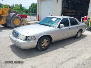 2004 Mercury Grand Marquis LS Premium z VIN 2MEFM75W74X664774, wystawiony jako IAAI lot #42111972 z przebiegiem 273 203 mil mil oraz . Historia ofert i sprzedaży dostępna na DreamBid. Obrazek 2.