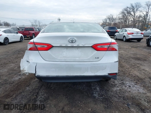 2020 Toyota Camry LE with VIN 4T1C11AK9LU912585, listed as a IAAI auction lot 41711816 with 142,751 mi miles. Bid and sale history available at carsss.com. Image 16.