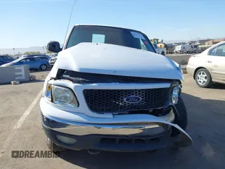 1999 Ford F-150 XL с VIN 1FTRX18L0XKB29703, выставлен на аукционе IAAI как лот 41644163 с пробегом Не указан миль и . История ставок и продаж доступна на DreamBid. Изображение 12.