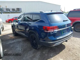 2018 Volkswagen Atlas SEL z VIN 1V2MR2CA4JC512804, wystawiony jako IAAI lot #42528402 z przebiegiem 59 226 mil mil oraz . Historia ofert i sprzedaży dostępna na DreamBid. Obrazek 3.