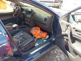 2014 Nissan Maxima SV z VIN 1N4AA5AP5EC491087, wystawiony jako IAAI lot #41802153 z przebiegiem Nie podano mil oraz . Historia ofert i sprzedaży dostępna na DreamBid. Obrazek 5.