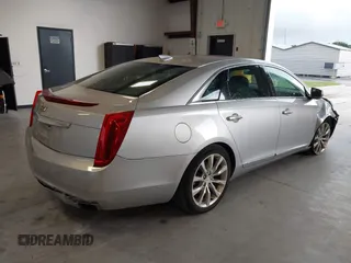 2016 Cadillac XTS Luxury Collection with VIN 2G61M5S34G9189820, listed as a IAAI auction lot 42660069 with 72,489 mi miles and . Bid and sale history available at DreamBid. Image 4.