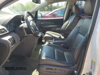 2015 Honda Odyssey Touring Elite with VIN 5FNRL5H92FB504977, listed as a Copart auction lot 56657195 with 189,438 mi miles and Salvage title. Bid and sale history available at DreamBid. Image 7.