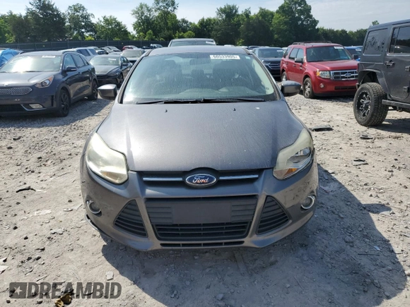 2012 Ford Focus SE with VIN 1FAHP3F21CL183104, listed as a Copart auction lot 60533905 with 199,869 mi miles and Clean title. Bid and sale history available at DreamBid. Image 5.