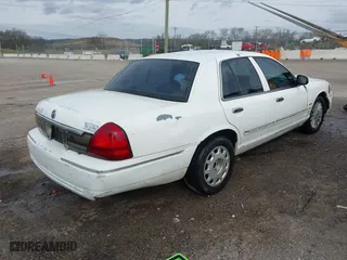 2009 Mercury Grand Marquis LS with VIN 2MEHM75V19X608157, listed as a IAAI auction lot 41839999 with 171,739 mi miles. Bid and sale history available at carsss.com. Image 4.