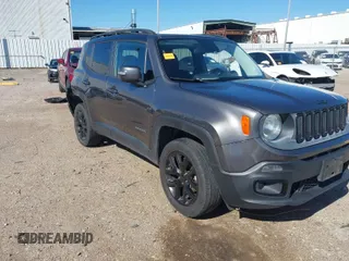 2016 Jeep Renegade Latitude with VIN ZACCJBBT0GPE12727, listed as a IAAI auction lot 41722294 with 114,561 mi miles. Bid and sale history available at carsss.com. Image 1.