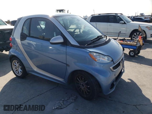 2013 Smart fortwo Pure with VIN WMEEJ3BA6DK674305, listed as a Copart auction lot 56100835 with 78,158 mi miles and Salvage title. Bid and sale history available at DreamBid. Image 4.