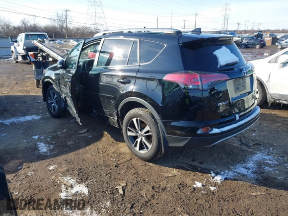 2018 Toyota RAV4 XLE with VIN 2T3RFREV1JW808773, listed as a IAAI auction lot 41595377 with 109,309 mi miles. Bid and sale history available at carsss.com. Image 3.