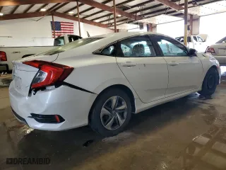 2019 Honda Civic Sedan LX with VIN 2HGFC2F6XKH604454, listed as a Copart auction lot 47234695 with 128,095 mi miles and Salvage Title. Bid and sale history available at carsss.com. Image 3.