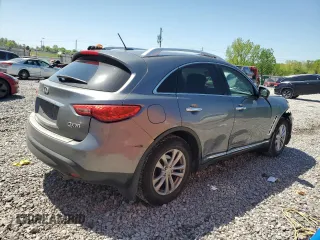 2014 Infiniti QX70 with VIN JN8CS1MU1EM451534, listed as a Copart auction lot 52677335 with 118,862 mi miles and Salvage Title. Bid and sale history available at DreamBid. Image 3.